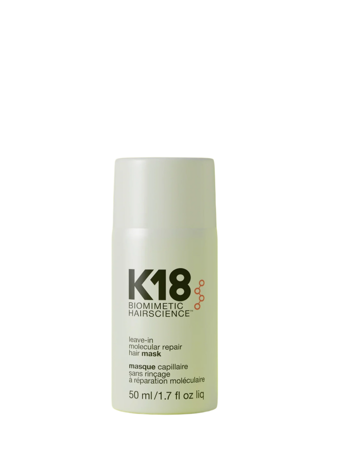 A bottle of K18 Leave-In Molecular Repair Hair Mask on a yellow background.