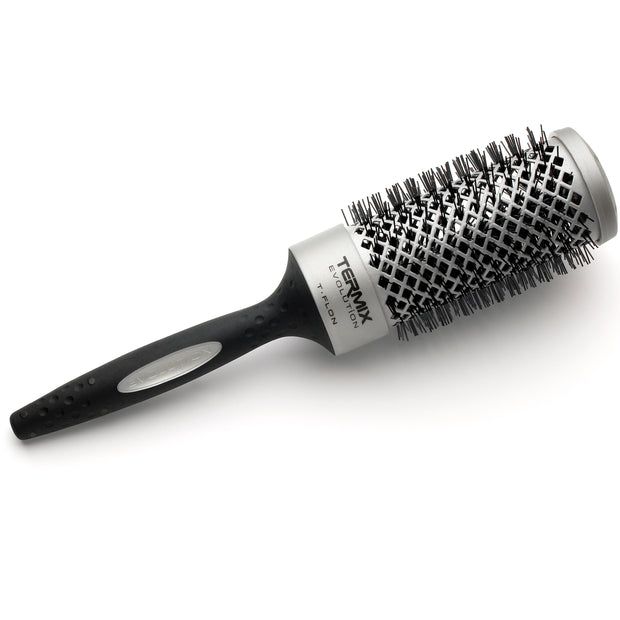 what brush does a hairdresser use to smooth frizzy hair