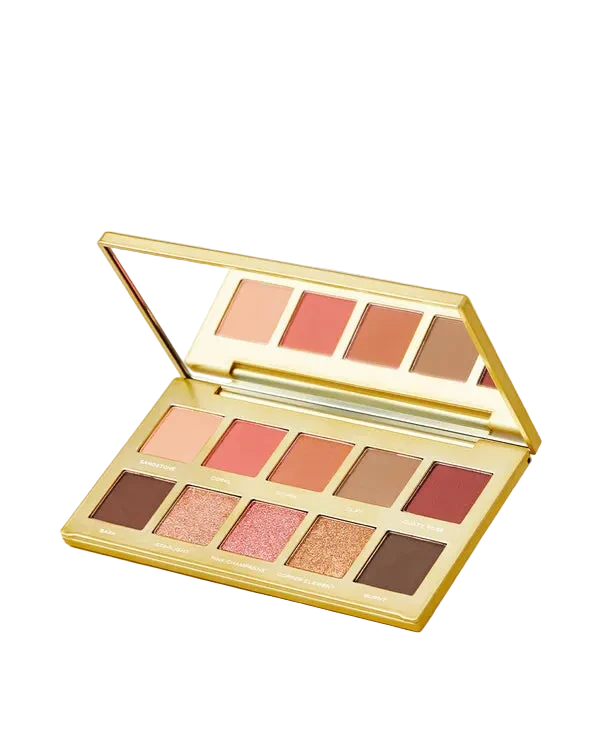 Makeup palette with various shades of eyeshadows on a light gray background