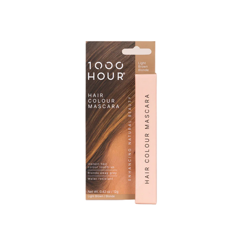 Packaging of 1000Hour Hair Colour Mascara in Light Brown/Blonde with the product visible in a standing position against a light background.