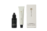Brow Code skincare products including a bottle, tube, and box on a white background
