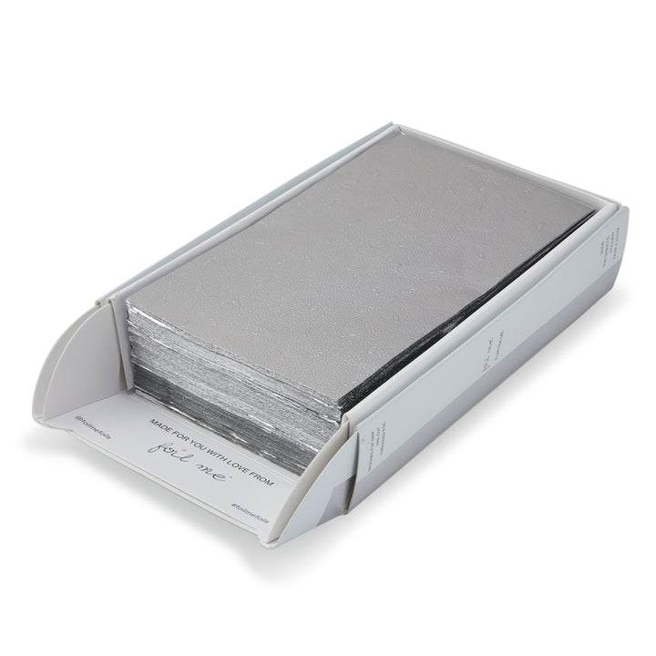 White box with foils inside the box with the brand name ' foil me ' ontop of a white background