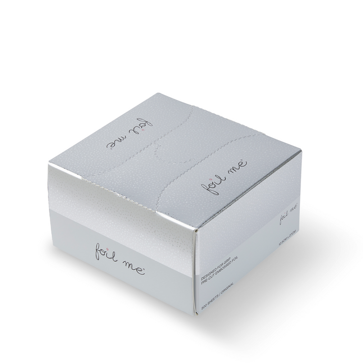 Silver foil packaging box with 'foil me' text on a white background
