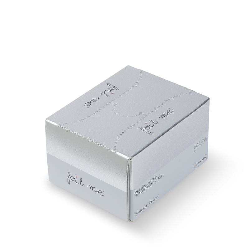 Silver foil packaging box with 'foil me' text on a white background