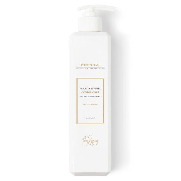 keratin infused conditioner safe to use on coloured hair in a white 500ml pump bottle