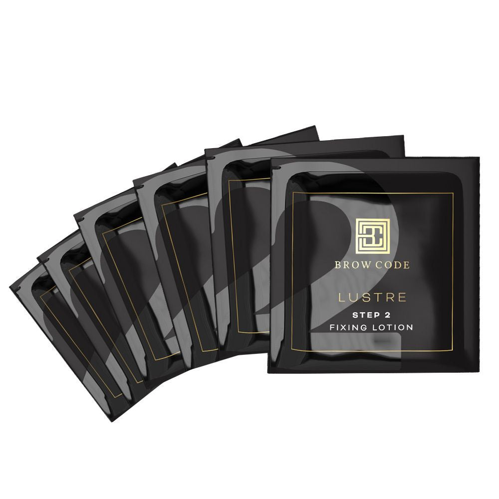 brow code lustre step 2 fixing lotion is a pack of 20 single dose sachets in black and gold packaging for lamination of eyebrows